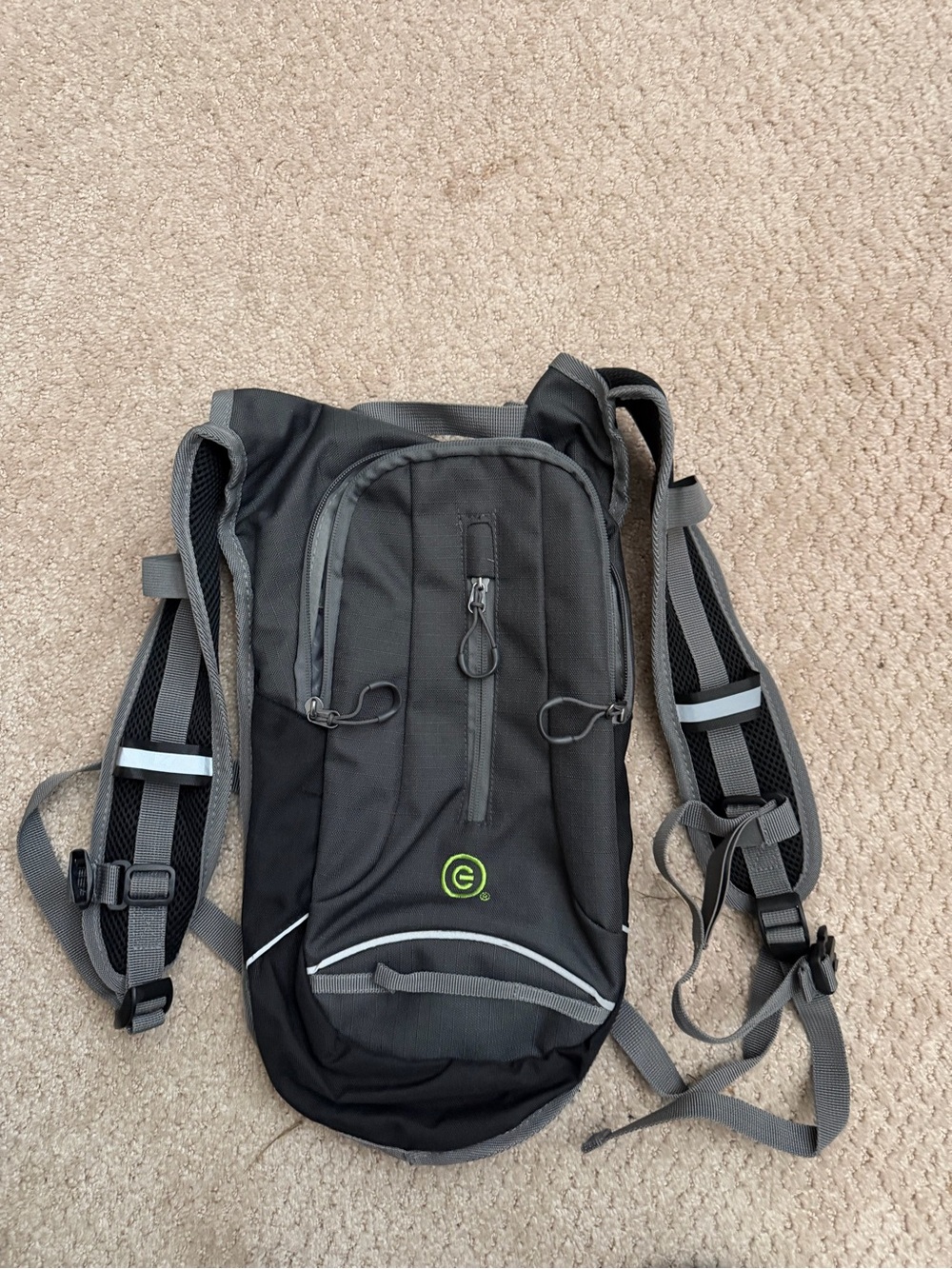 Compact Black Hydration Backpack with Gray Accents
